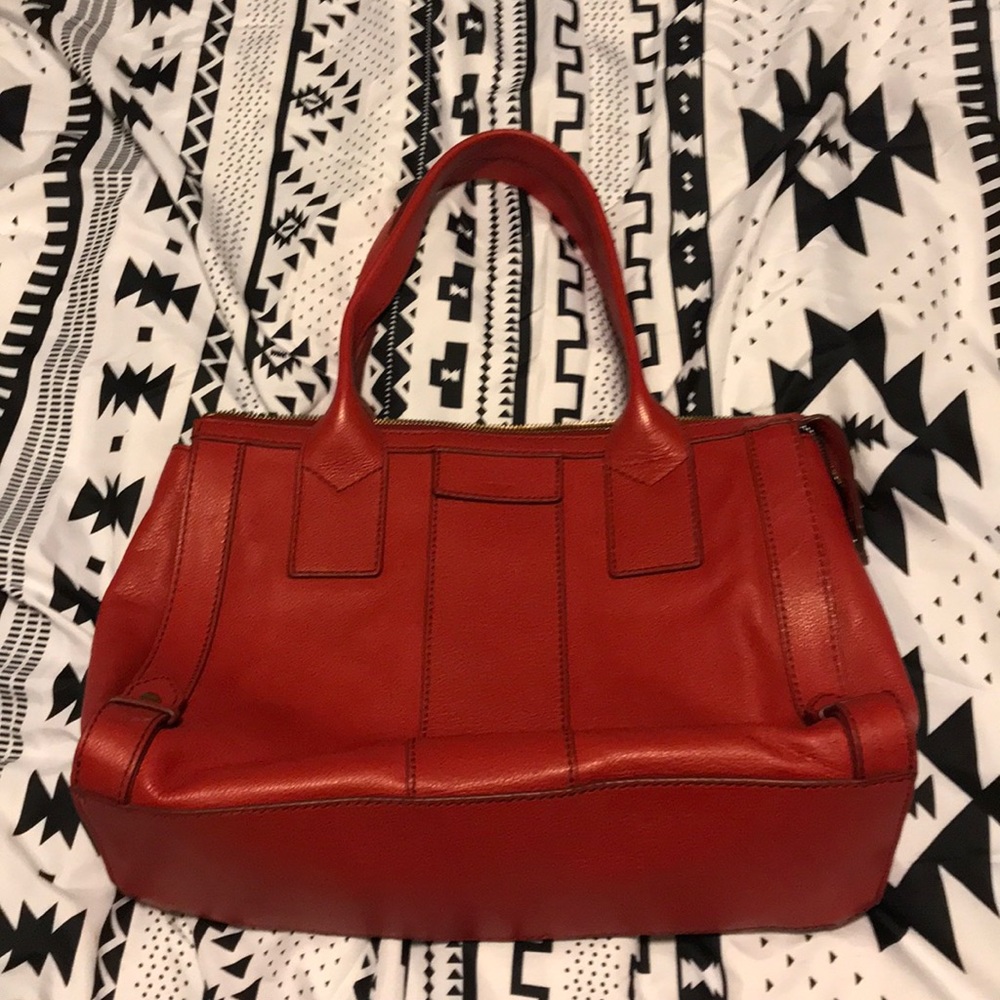 Red fossil bag